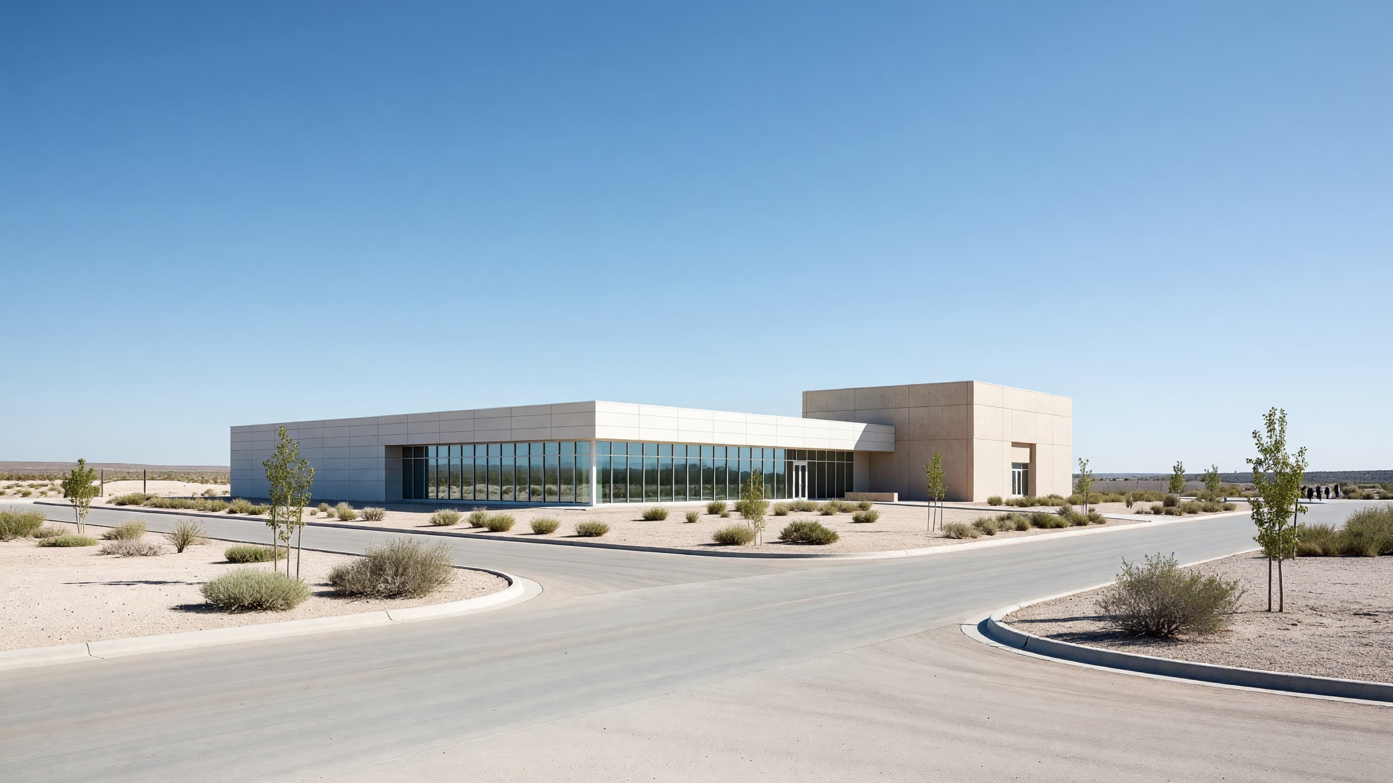A modern national-laboratory nuclear research campus in open high desert under a clear blue sky, representing the DOE Genesis Mission's 278 projects. Illustration: NNN
