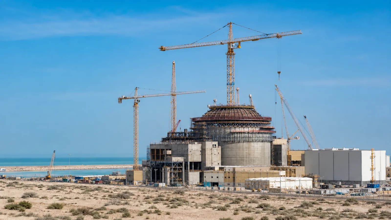 The Bushehr Nuclear Power Plant Unit 2 construction site on Iran's Persian Gulf coast, illustrating Rosatom's return of engineering staff and continued work on Units 2 and 3. Illustration: NNN