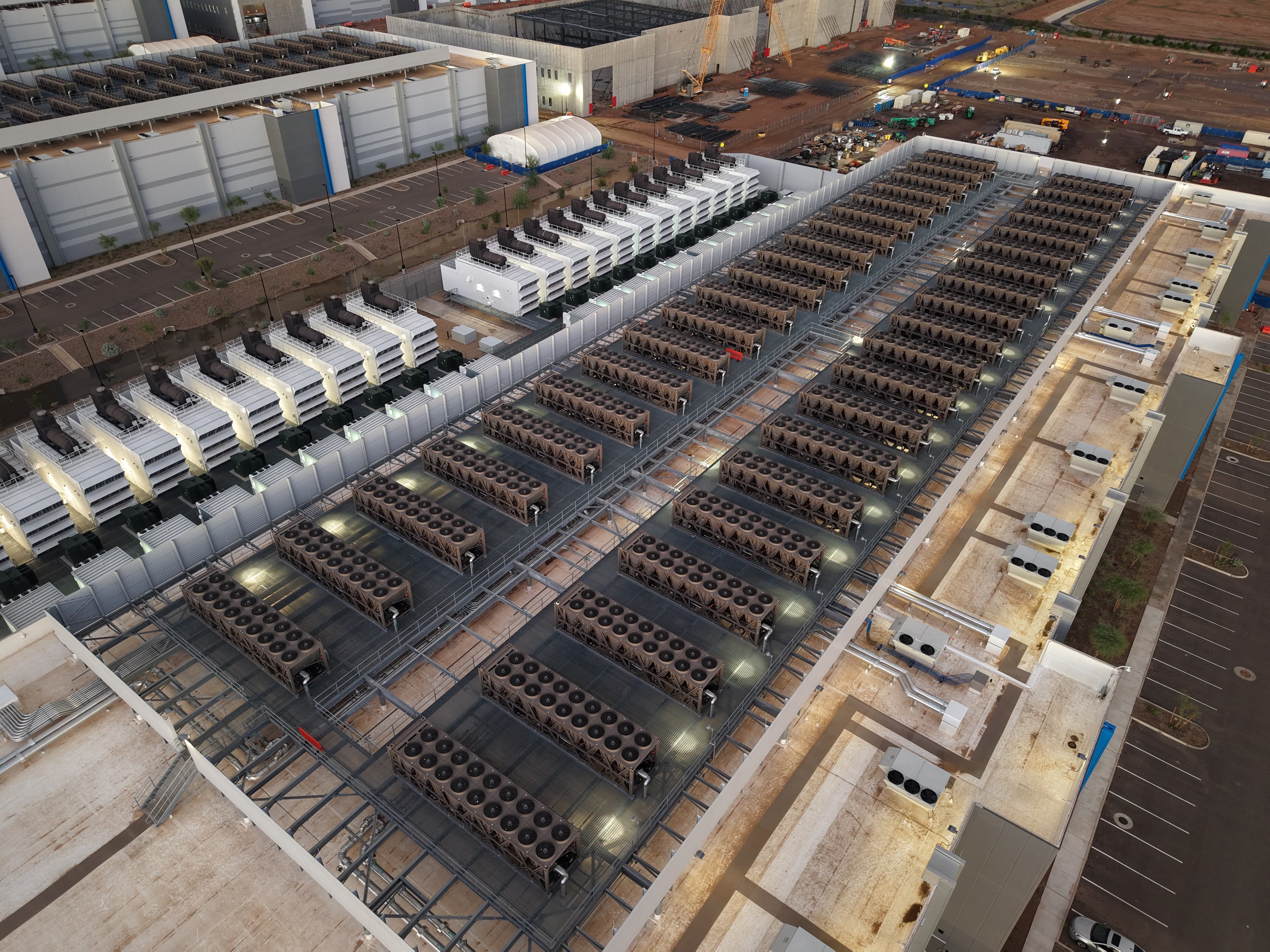 Roof of a data center with cooling towers and backup generators, illustrating the IEA's report on 45 GW of conditional data-center and SMR offtake agreements. Image: Rsparks3 / Wikimedia Commons (CC0)