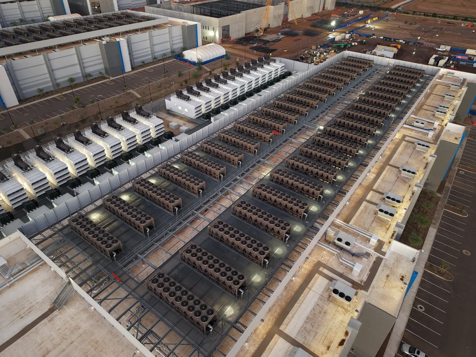 Roof of a data center with cooling towers and backup generators, illustrating the IEA's report on 45 GW of conditional data-center and SMR offtake agreements. Image: Rsparks3 / Wikimedia Commons (CC0)