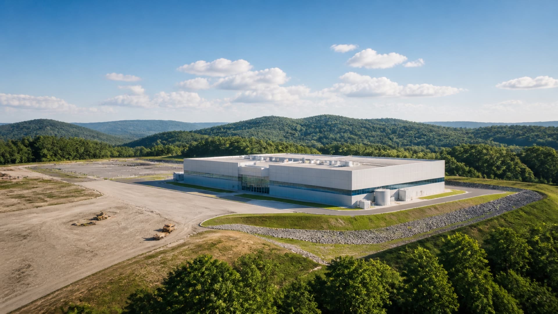 A planned centrifuge enrichment facility in Oak Ridge’s green industrial landscape, representing the NRC hearing process for Orano’s Project Ike. Illustration: NNN
