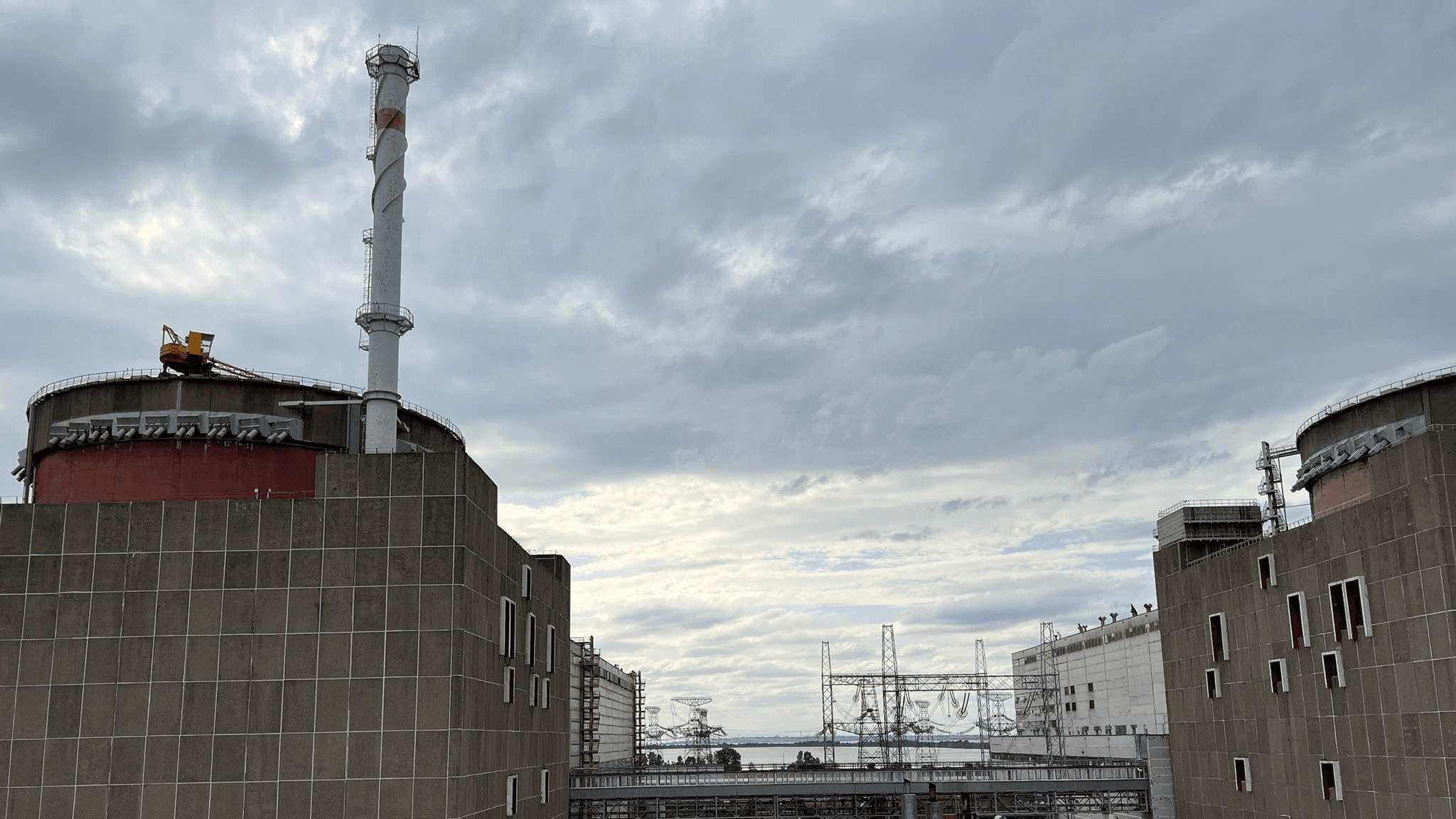 The Zaporizhzhya Nuclear Power Plant's twin VVER-1000 reactor buildings and the high-voltage switchyard between them, where repairs to the 330 kV Ferosplavna-1 line began under an IAEA-brokered ceasefire on 5 September 2026. Image: IAEA Imagebank (CC BY 2.0)